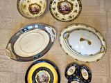 a lot of plates and bowls on the floor