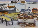 many boats that are sitting on the shore of the water
