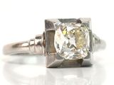 an image of a diamond ring on a white surface