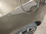 a close up of a car ' s door handle with a mirror on it