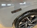 a close up of a car with a sticker on the side of it