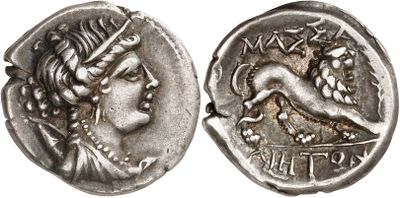 a silver coin with an image of a woman and a horse on it