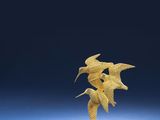 two birds are flying in the air on a blue surface