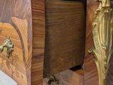 a wooden table with a drawer on top of it