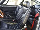 an image of a car with leather seats and steering controls