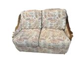 an image of a couch that has a floral pattern on it