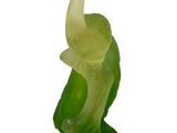 a green statue of an elephant on a white background