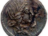 une pièce de monnaie en argent portant un visage de femme
