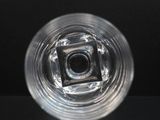 a close up view of a glass of water on a table
