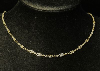 a close up of a necklace on a mannequin mannequin mannequin mannequin mannequin mannequin mannequin mannequin