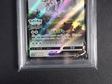 an image of a pokemon trading card in a plastic case