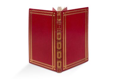 un livre rouge ouvert, bordé d'or, sur fond blanc