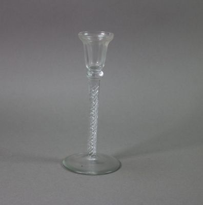 a glass vase that is sitting on a table