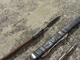 a lot of tools that are laying out on the ground