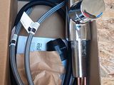 a box that has a hose and a hose in it