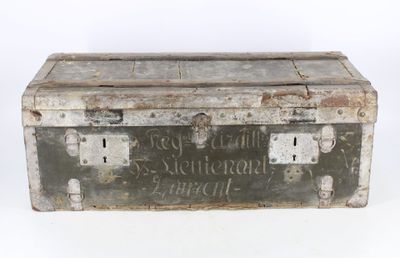 an old metal box with writing on it