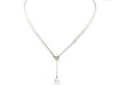 a close up of a necklace with a pearl on a white background