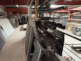 a large amount of steel pipes in a warehouse