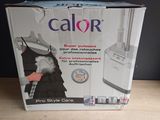 packaging of a blender sitting on top of a wooden table
