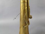 an image of a brass trumpet with a bell on a white background
