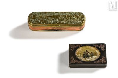 two small tins with a picture of a man and a woman on them
