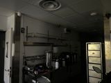 a room that has a bunch of appliances in it
