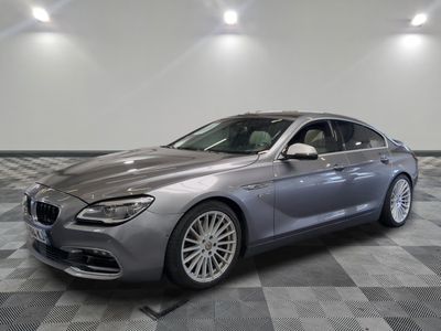 La BMW Série 6 Grano est garée dans un showroom