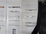 a man standing in front of a wall of lockers