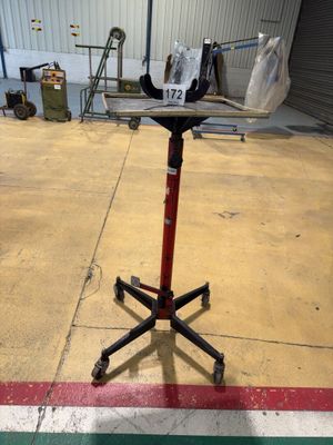 an image of a stand that has a bag on top of it