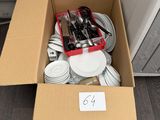 a box full of silver and white plates and utensils