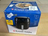 the box of the russell hobbs air fryer is on the table