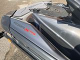 a close up of a motorcycle parked on the side of the road