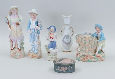 five figurines that are sitting on a table