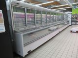 a refrigerated display case in a grocery store