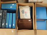 a box full of books sitting on top of a table