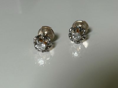 Paire de clous d'oreilles en or jaune 750 millièmes et platine sertis  - Photo 1