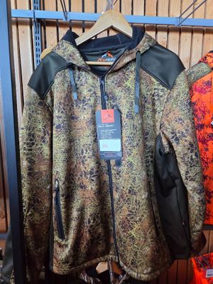 two jackets that are hanging on a rack in a store