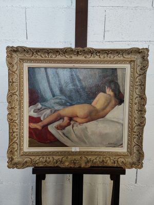 une peinture représentant une femme nue allongée sur un lit