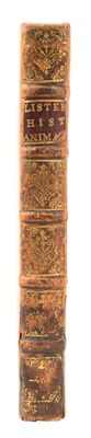 an old book that is sitting on a table