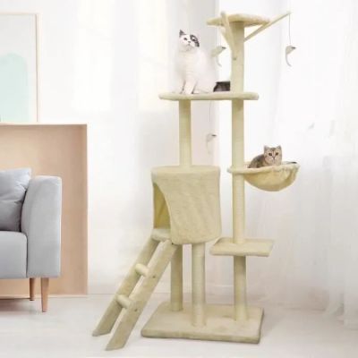 a cat sitting on a cat tree in a living room