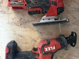 two electric tools sitting on top of a marble counter top