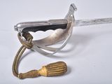 a knife and a rope on a white surface