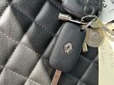 a car key with a tag attached to it
