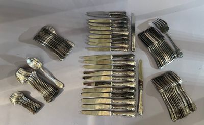 a lot of forks and knives on a table