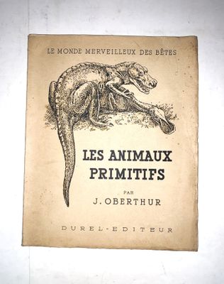 an old book with a drawing of a dinosaur on it