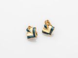 a pair of gold and blue enamel earrings