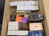 a cardboard box filled with many different types of electronic devices