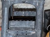 an image of an old stove and a tool box