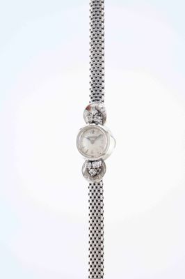 an image of a close up of a wrist watch on a white background