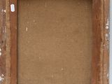 an old picture frame with a piece of paper taped to it